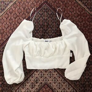 Princess Polly Elegant White Puff Sleeve Top. Never worn. In great condition.